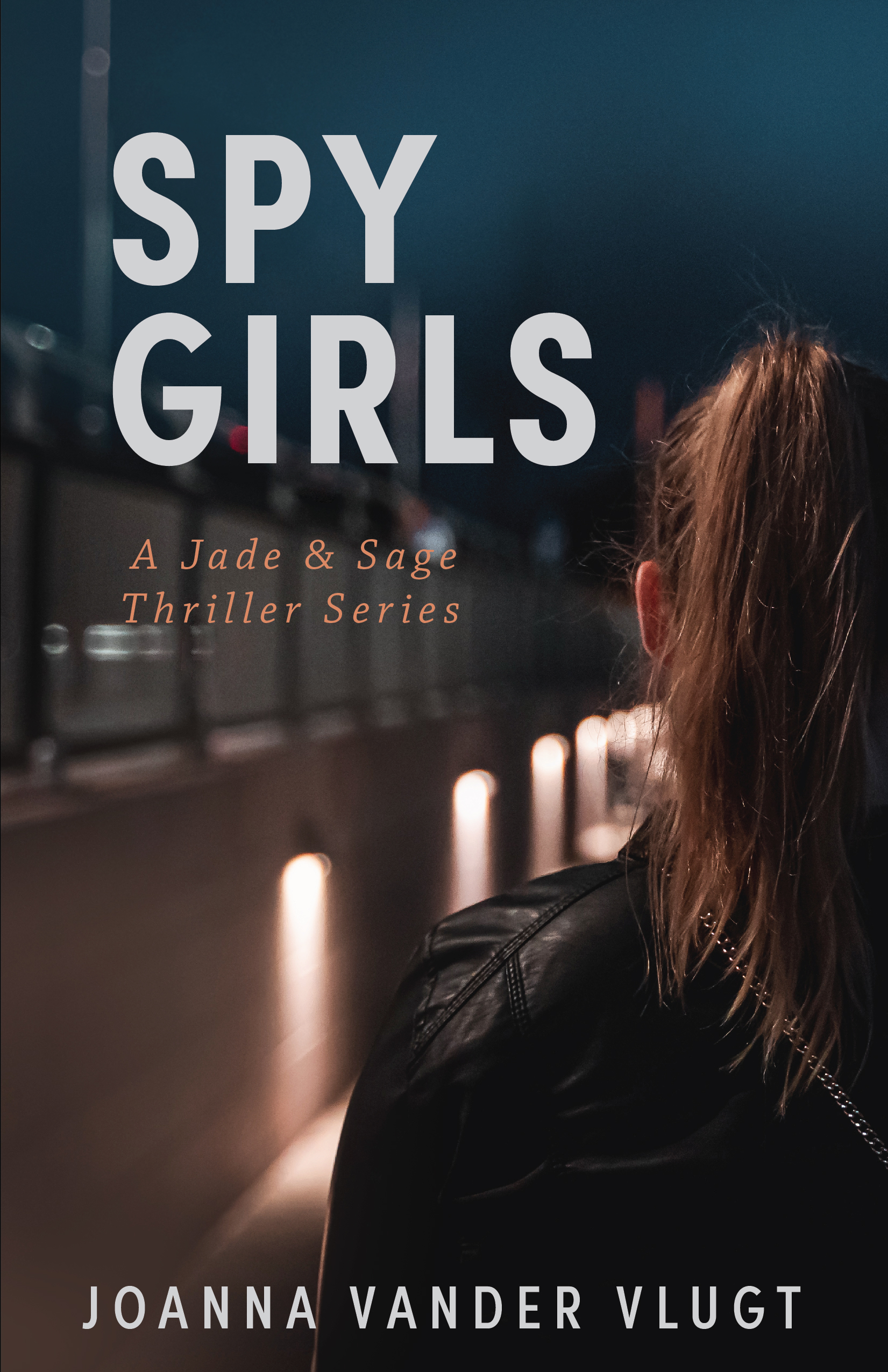 Cover of the book 'Spy Girls' by Joanna Vander Vlugt, featuring a girl with a ponytail facing away from the camera against a dimly lit background.